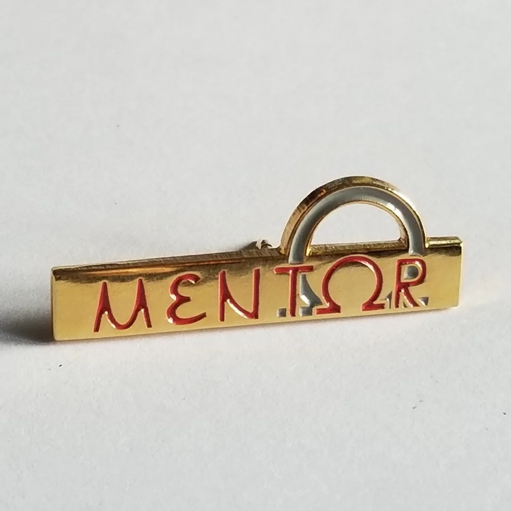 Mentor lapel pin Omega red enamel gold tone metal Greek symbol brooch